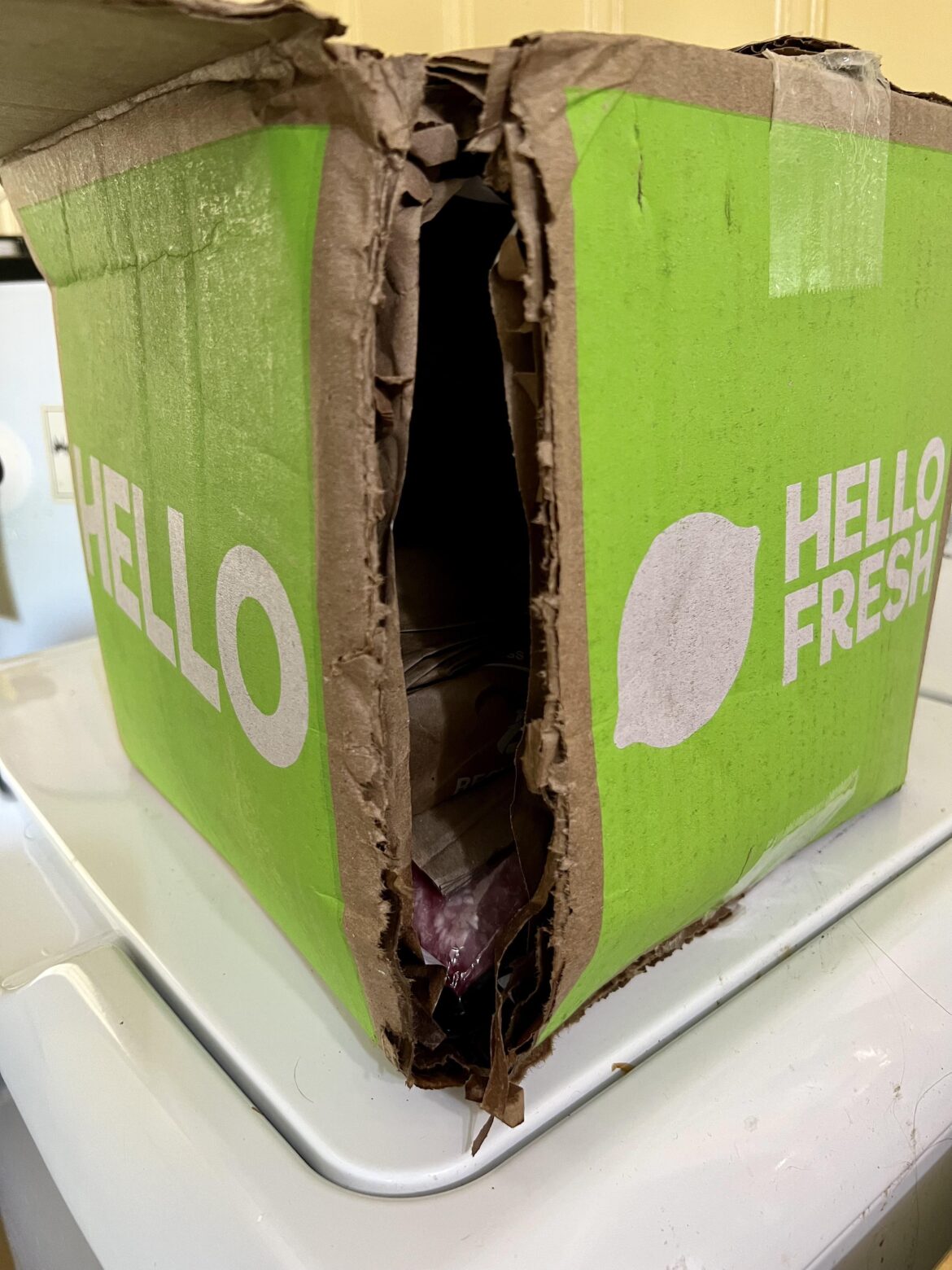 Box arrived like this - meats were mostly still sandwiched between ice packs but the bags were warm