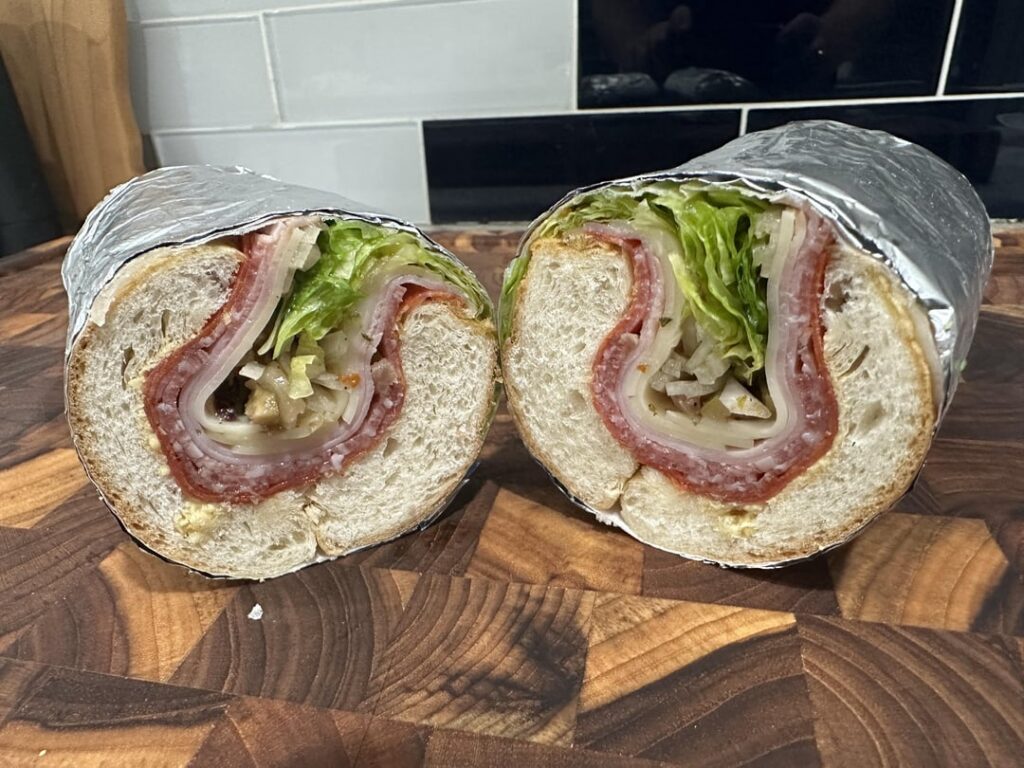 pepperoni, salami, ham and provolone w/ dijon, muffuletta mix, onion, lettuce and sub dressing