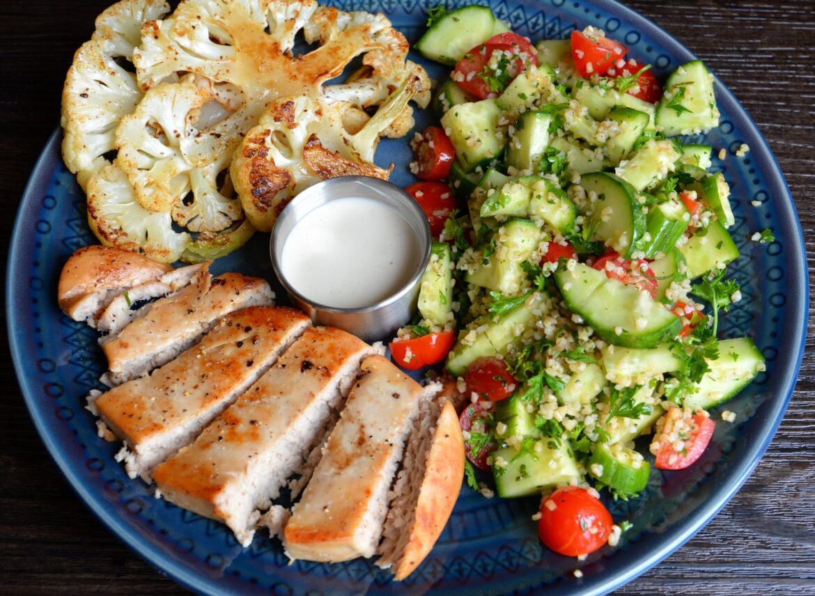 352 cal, 27 g protein - Meati chikn cutlet, tabouli, tahini sauce, pan fried seasoned cauliflower