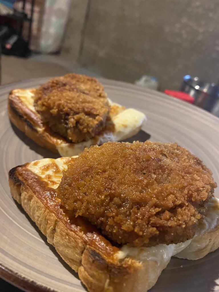 Open faced fried wild duck sandwich. With lemon garlic aioli and mozzarella.