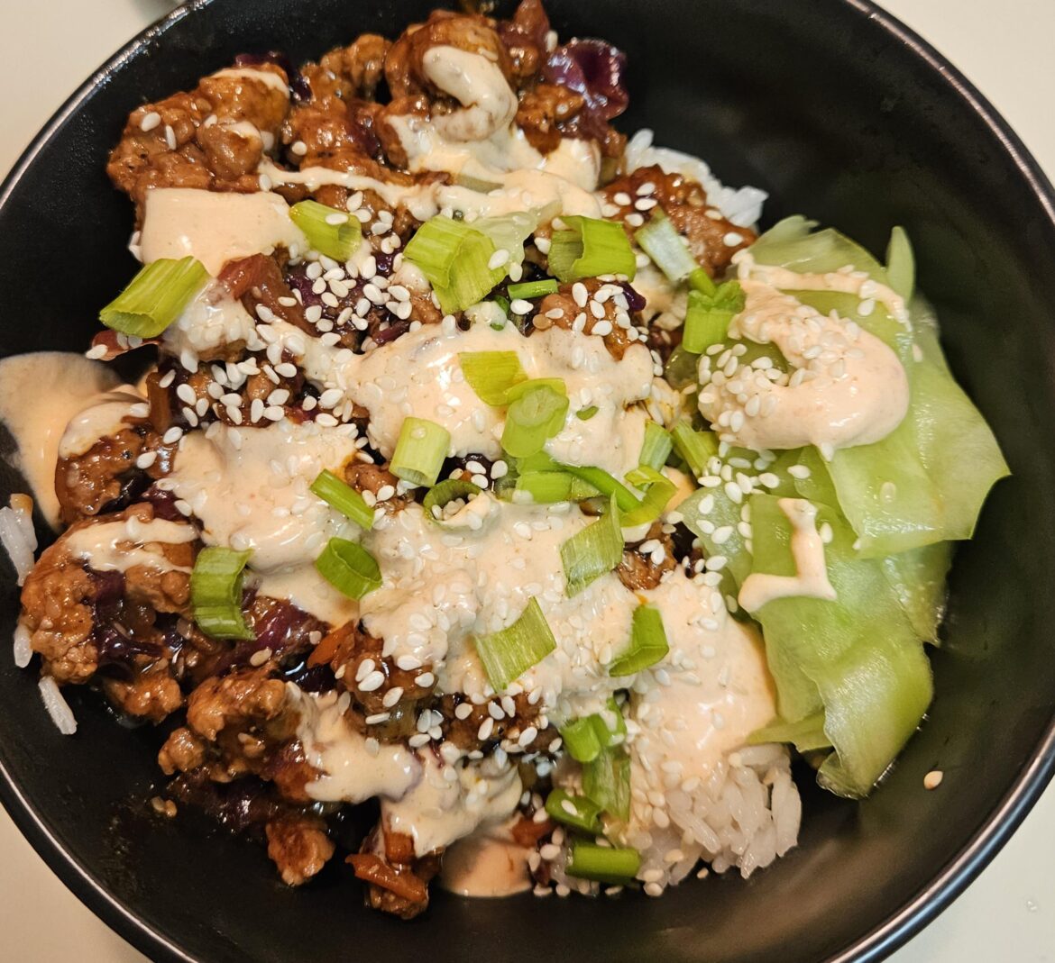 Unami Ginger Pork with Pickled Cucumbers & Siracha Crema