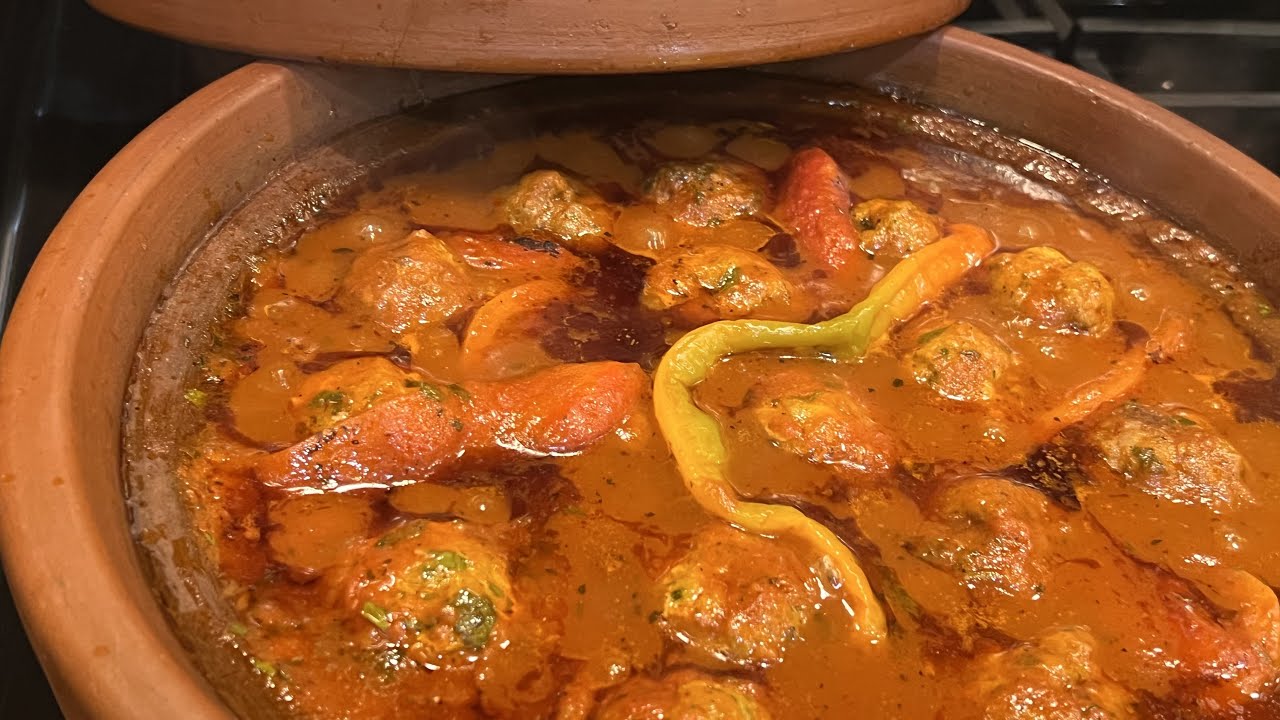 Traditional Moroccan Fish Tagine Dining and Cooking