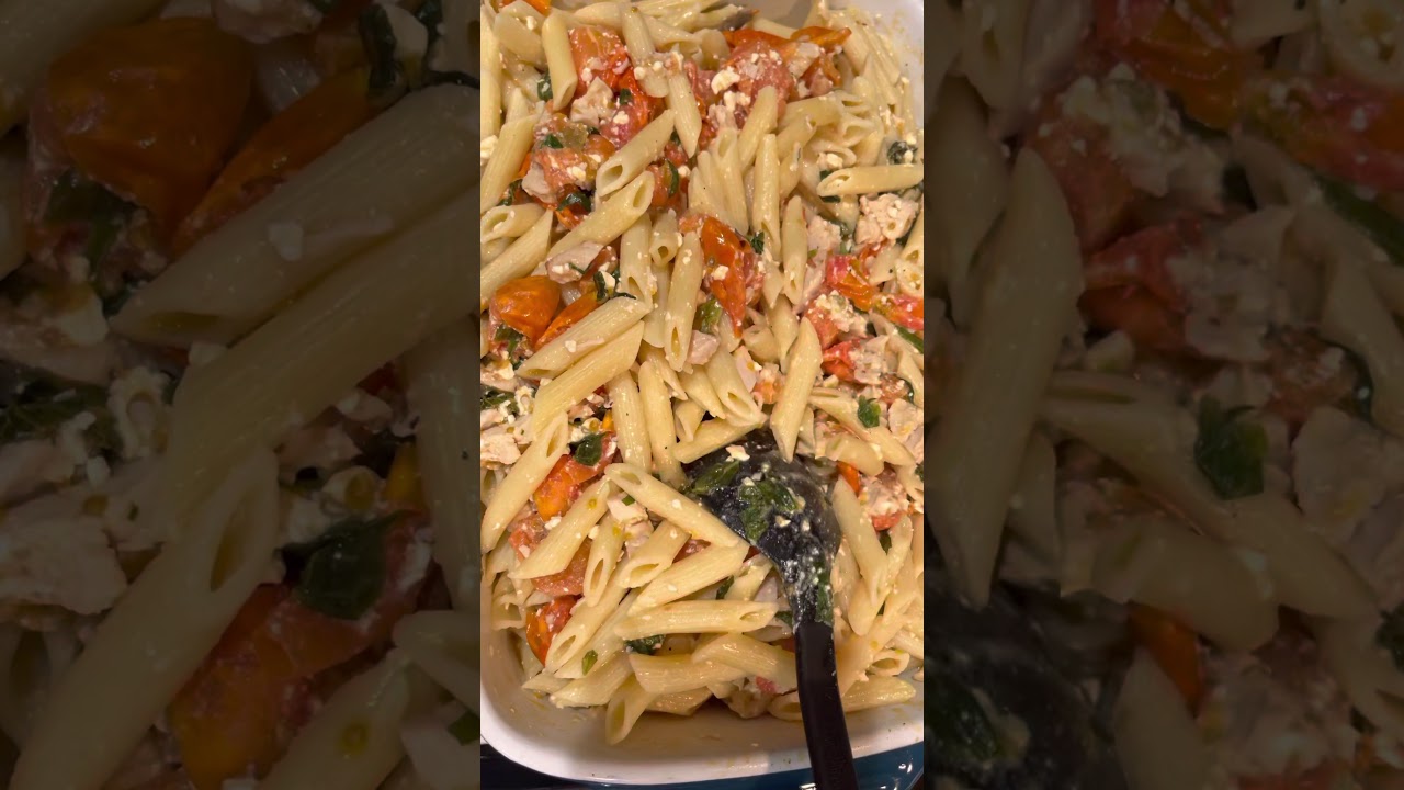 Feta cheese pasta with cherry tomatoes, basil, garlic, grilled chicken