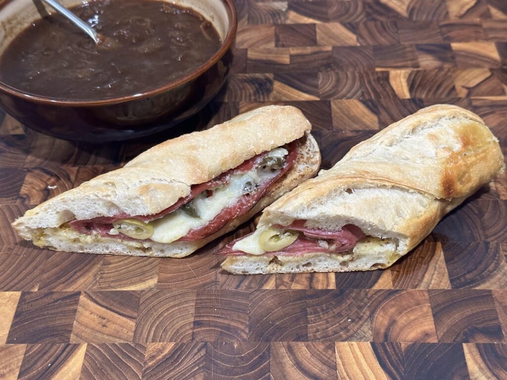 salami, dijon, giardiniera and gruyère on a baguette w/ homemade french onion soup.