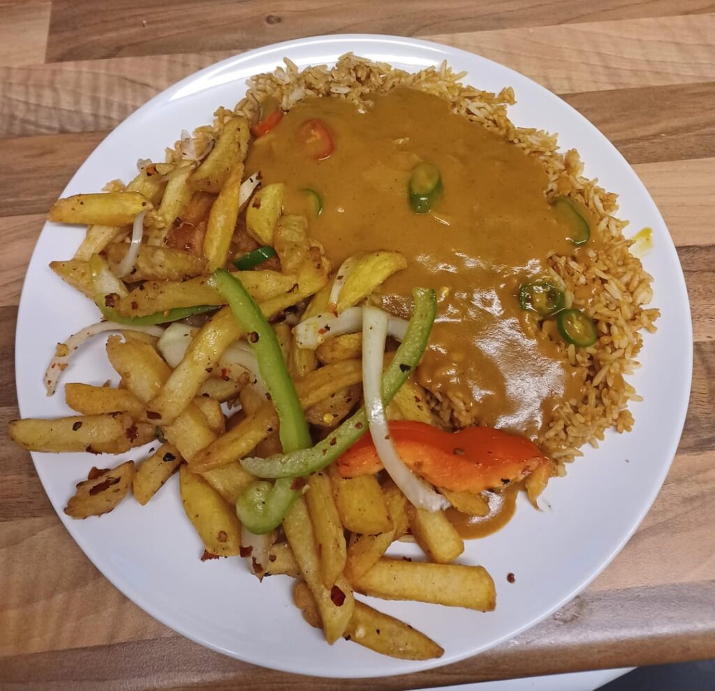 Fried rice, salt and chili chips and curry sauce