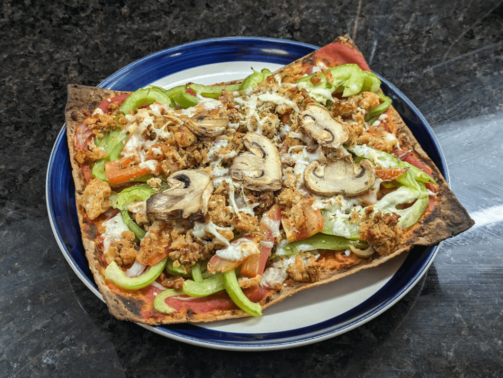 I tried a homemade pizza, cost me about $3 without including the cost of spices. Pretty filling for only 360 calories. Ingredients in comment, 2nd picture is my entry in MyNetDiary for the meal.