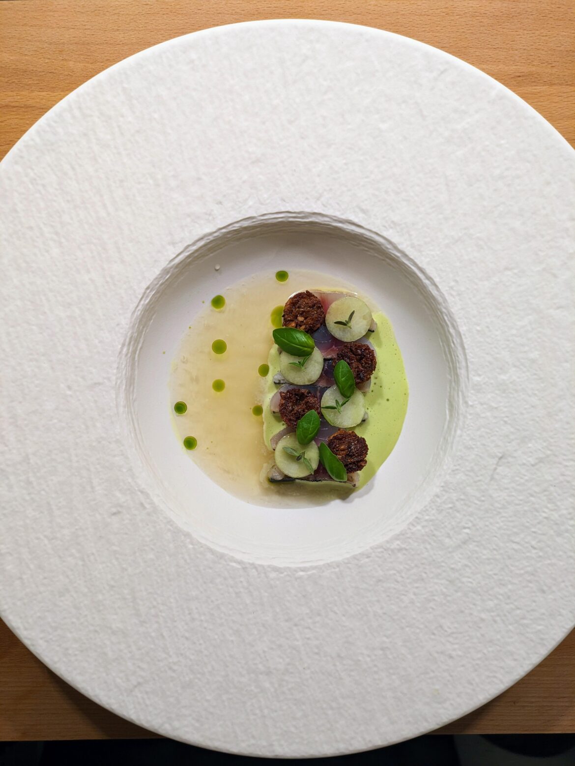 Cured and grilled mackerel, basil foam, cucumber, ryebread, tomato dashi
