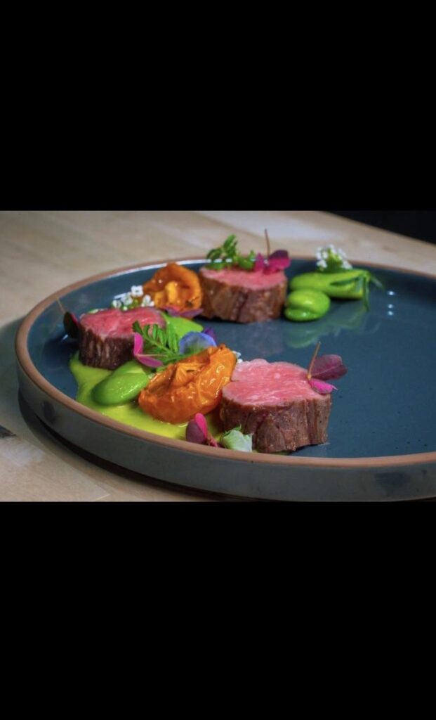 Snake River Filet / Fava & Smoked Arbequina / watercress / Roasted Bolzano Tomato