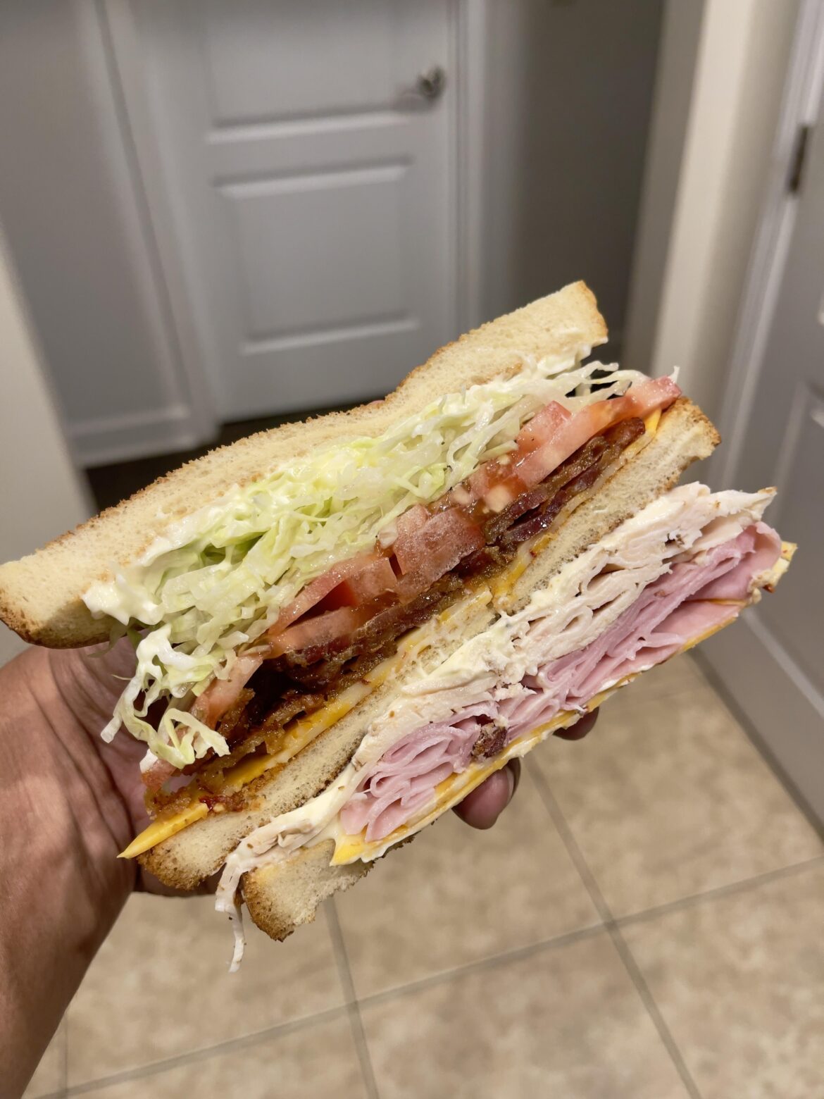 Club Sandwich on honey white bread.