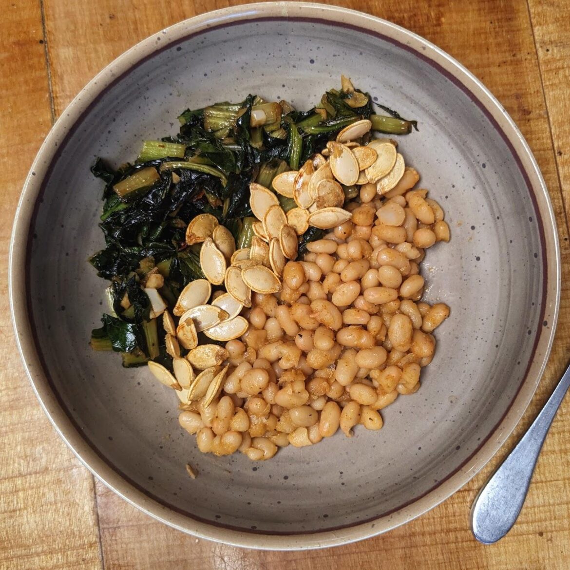 I was looking for something to eat with my pumpkin seeds & this was perfect! Sauteed Dandelion Greens with Smoky Navy Beans
