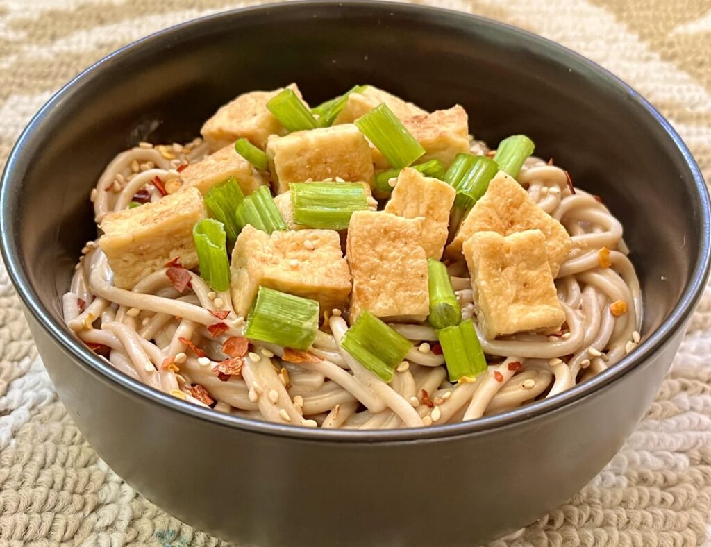 Garlic Tofu with Soba noodles tossed in peanut-soy sauce.