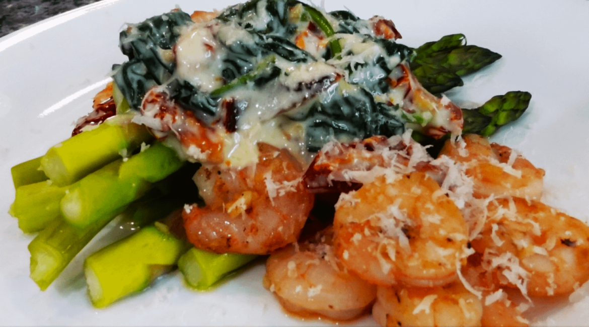 Keto Shrimp w/ Spinach & Sundried Tomato Sauce Over Asparagus