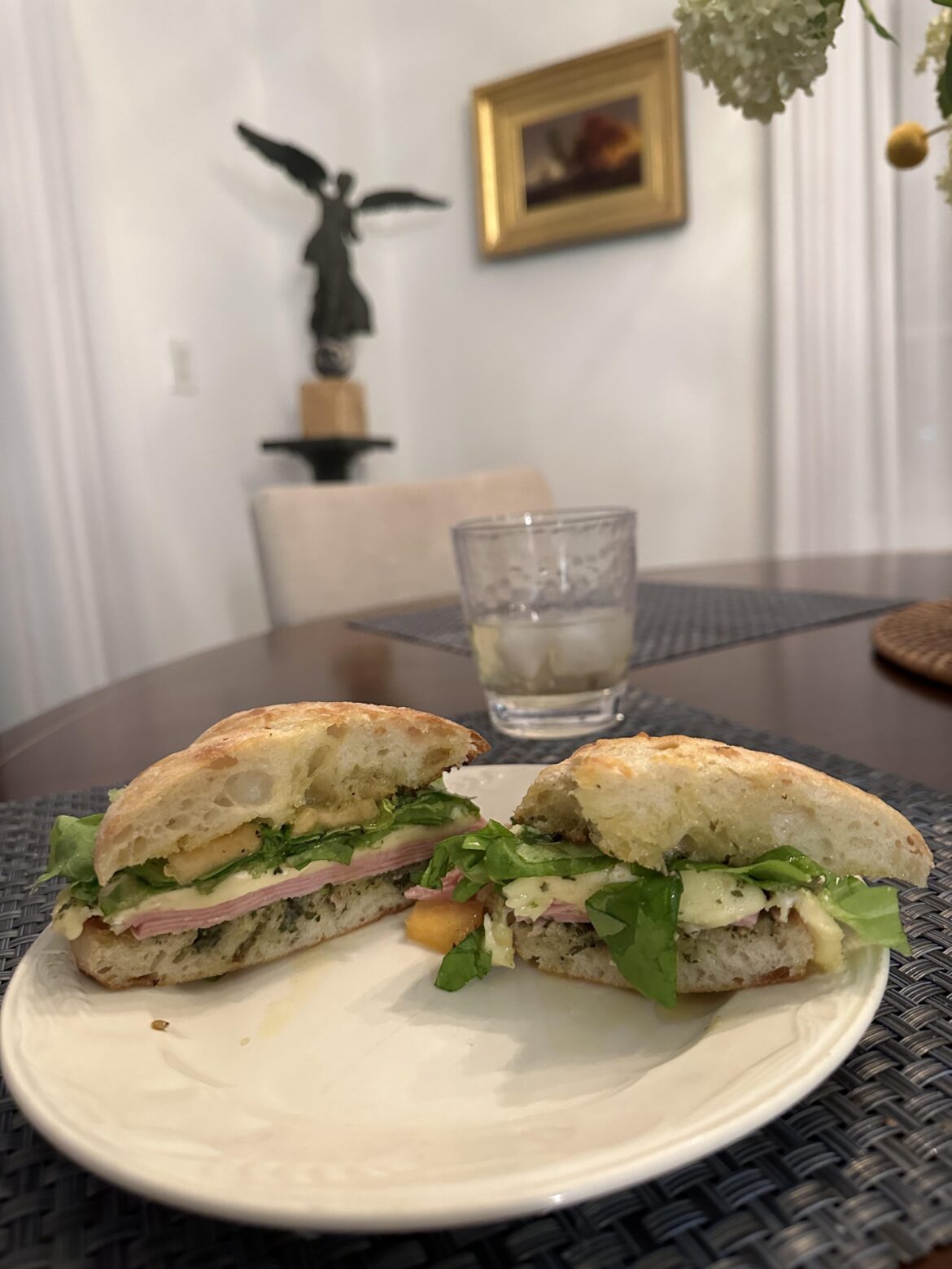 Pesto, mortadella, saint andre cheese, fresh greens, melon, salt pepper, evoo on ciabatta