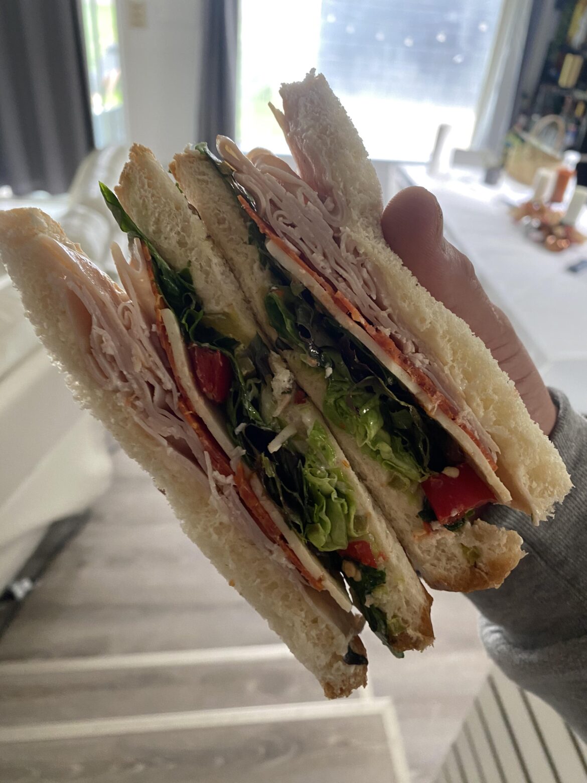 Turkey, pepperoni, white American cheese, mixed greens, pickled jalapeño, fresh picked Serrano’s, Marie sharps habanero hot sauce, mayo, sub sauce on white. So damn good.