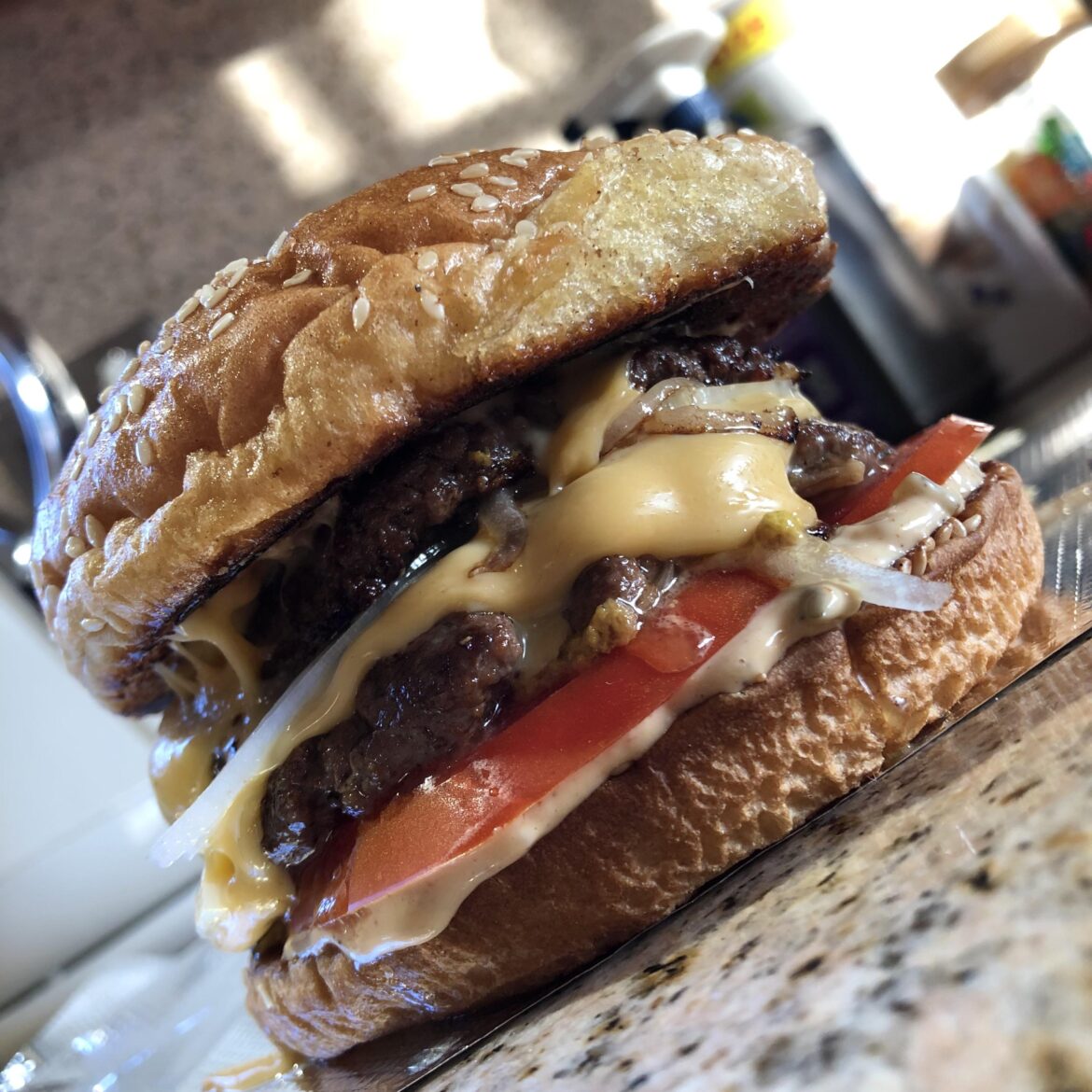 35% fat 3oz patties and a heavily toasted bun steamed in onion and beef vapor.