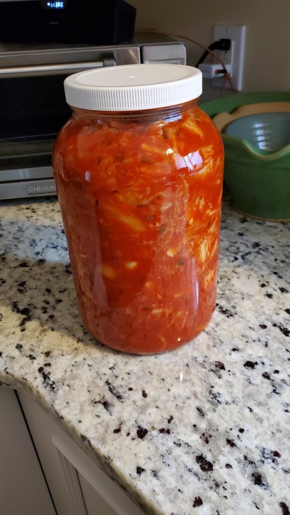 My neighbor made homemade kimchi with his own hot peppers and I get the first batch. Lucky me!