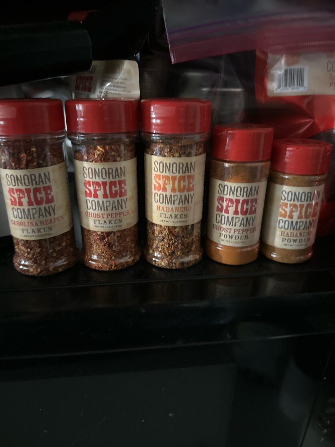 The new spices (and some whole dried peppers in the background) that I ordered from Sonoran Spice. Highly recommend them!
