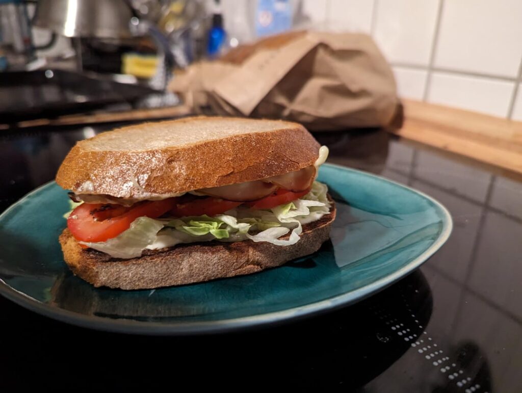 German Aldi bread toasted with young Gouda, chicken breast, tomatoes, lettuce and mayo