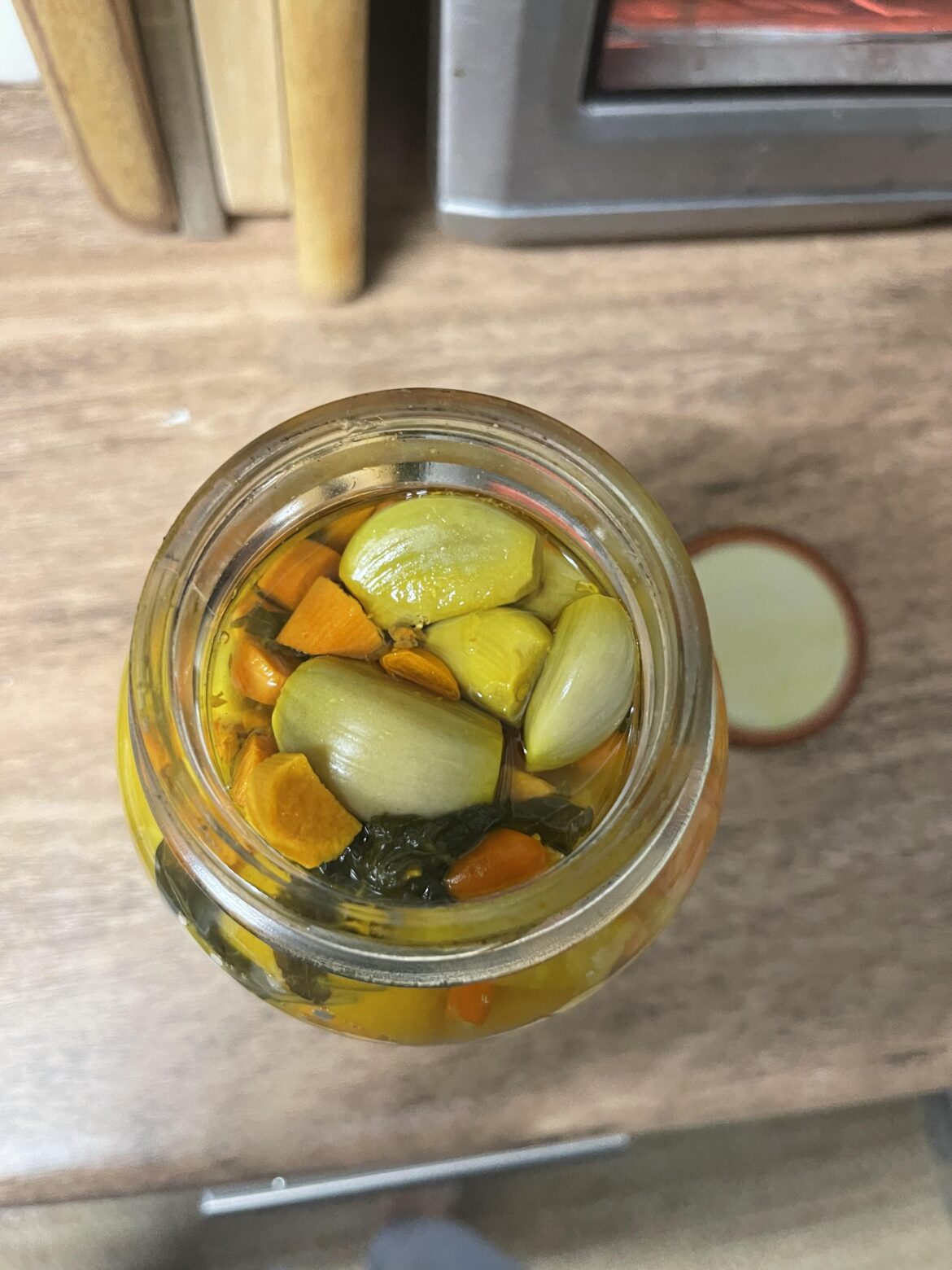 I’m not sure if this is the right sub… I made fire cider and let it sit for several weeks. Opened it today and the top part hasn’t been covered by the vinegar. Do I need to toss?