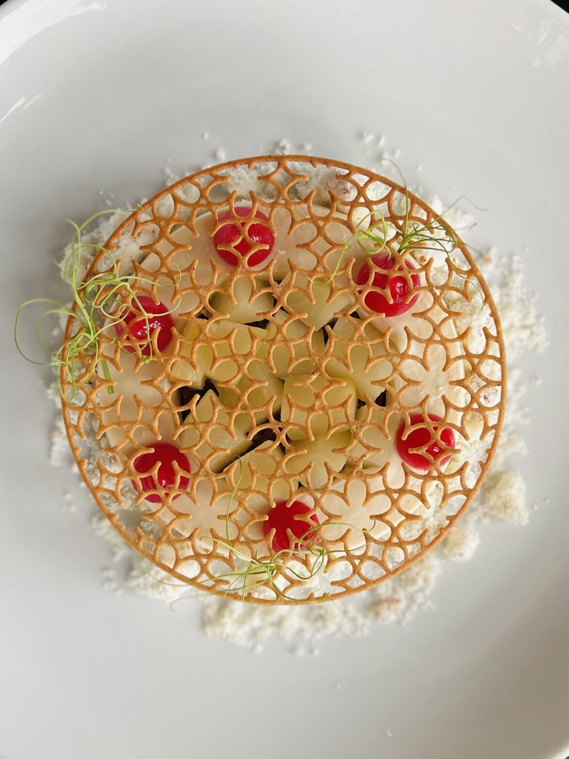 Mascarpone Panna cotta / White Wine Poached Pears / Stout Spice Cake / Cranberry Gel / Cinnamon Tuile / Brown Butter Snow