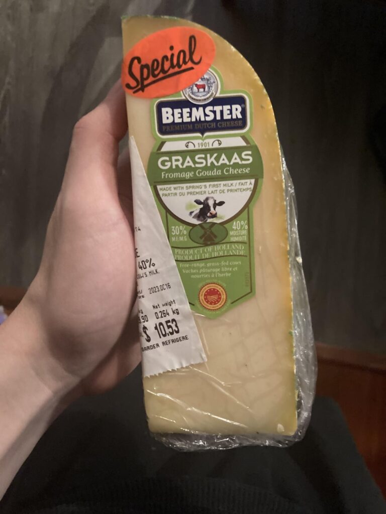 Gouda cheese with white mold edible?