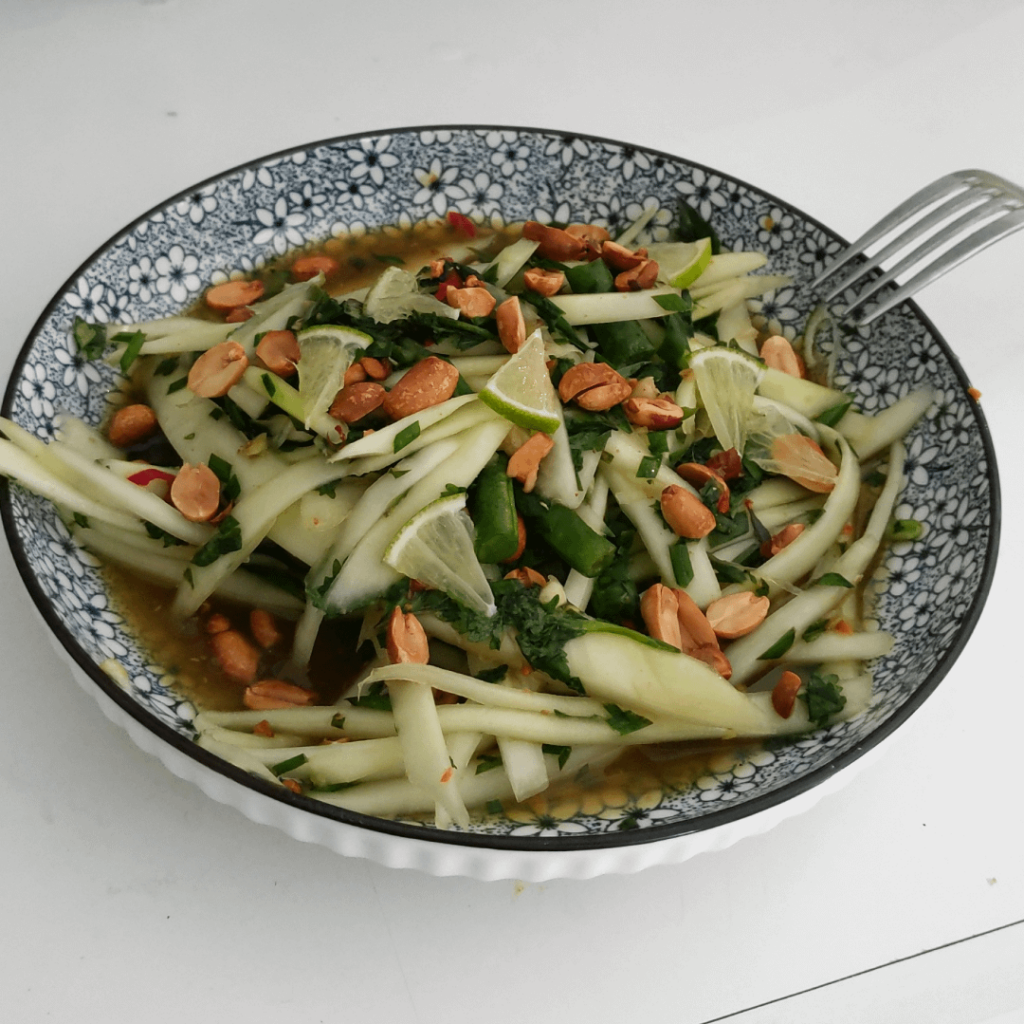 Som Tam Thai aka Green Papaya Salad. Very easy, no cook, fresh, spicy, sour, savory, healthy recipe. I've been obsessed with it lately.