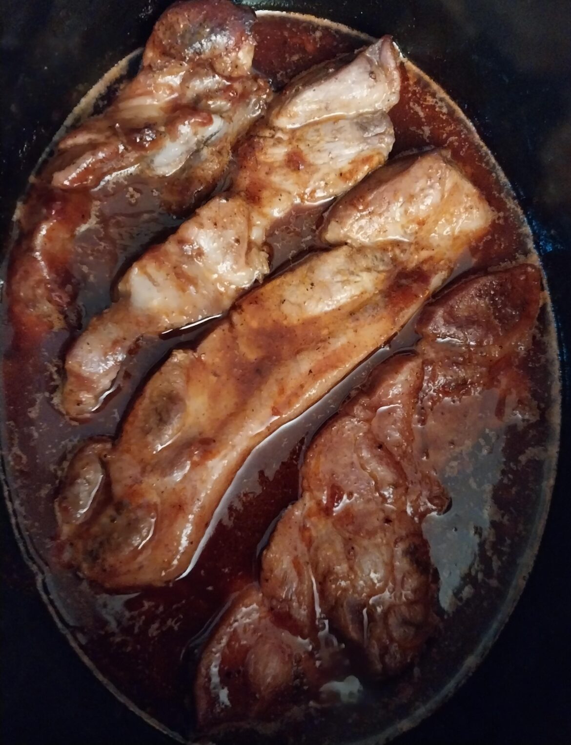 Slow cooking some pork country ribs that will be processed into pulled pork this afternoon. Easy and versatile recipe.