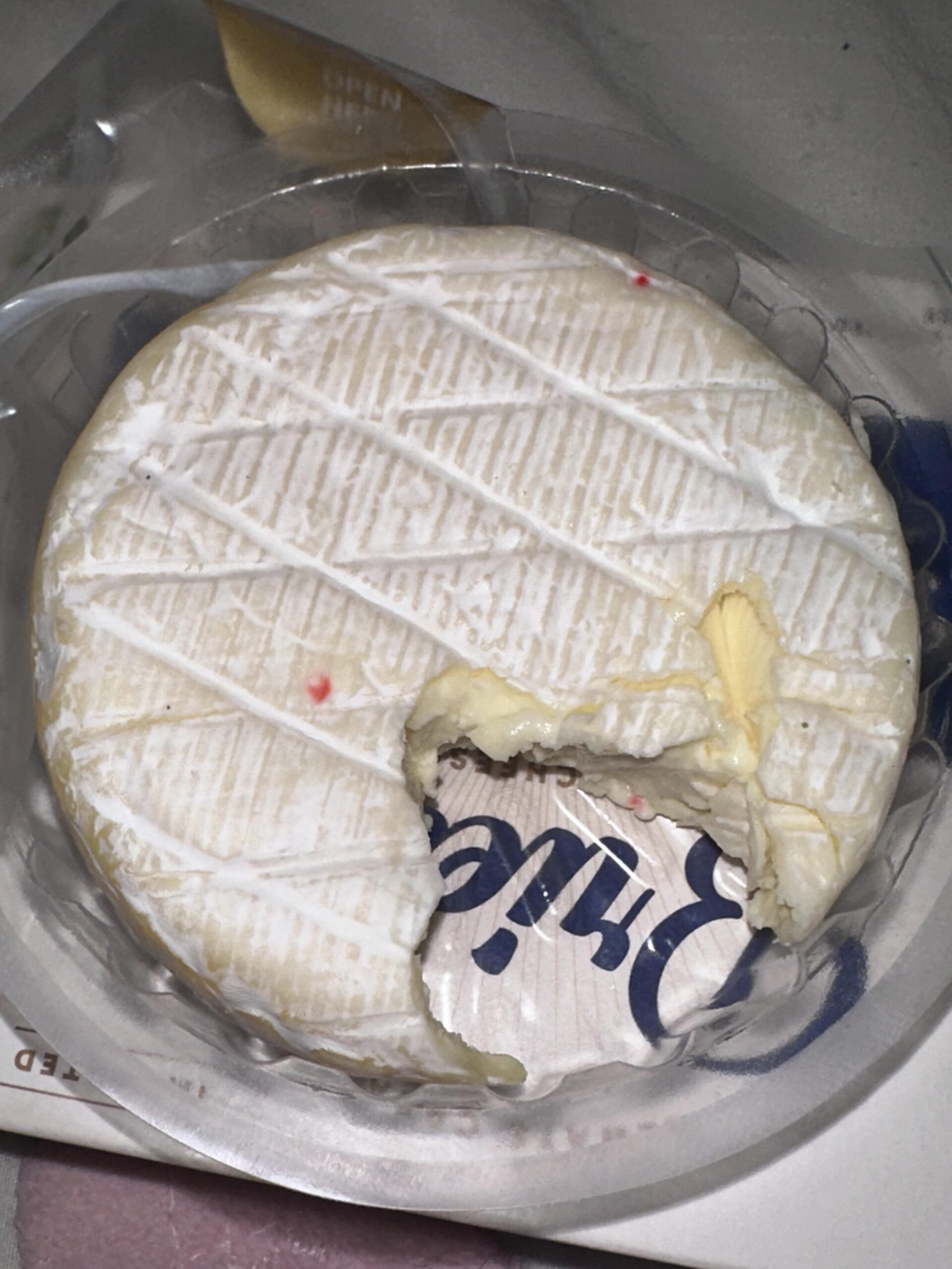 what are these red spots on my brie cheese? Dining and Cooking