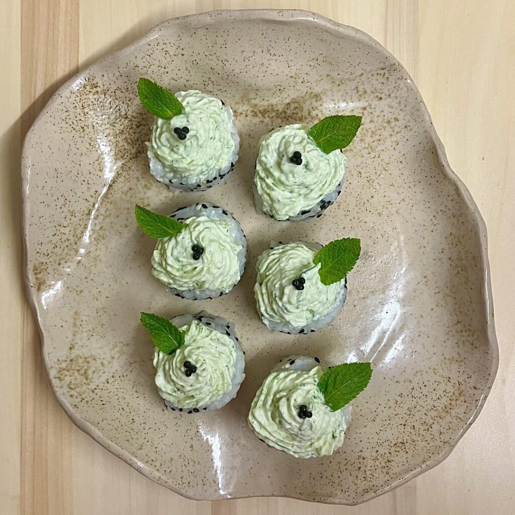 Salmon Uramaki topped with a Cucumber, Mint and Dill Mousse