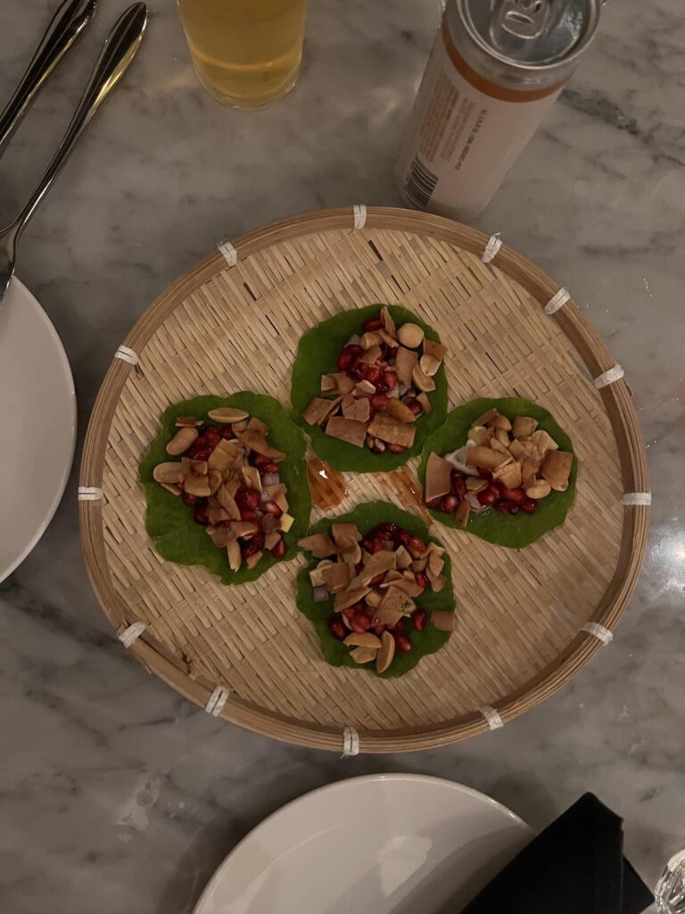 Saucy dish on fenestrated “plate”