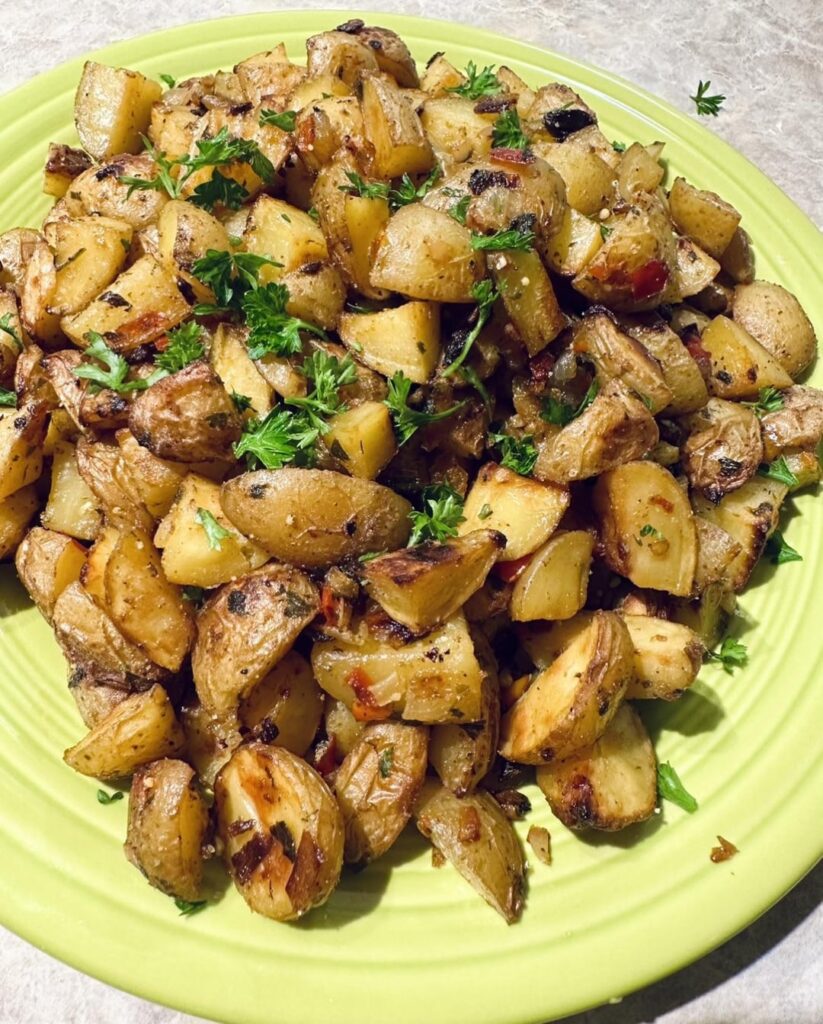 French toast, potatoes, eggs, and sausage.