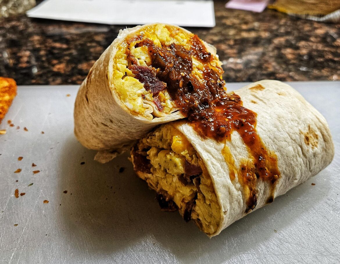 Breakfast burrito. Bacon, egg, cheddar, hash browns, chile de arbol salsa.