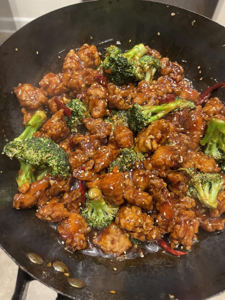 [Homemade] General Tso chicken with broccoli and shrimp Lo Mein.