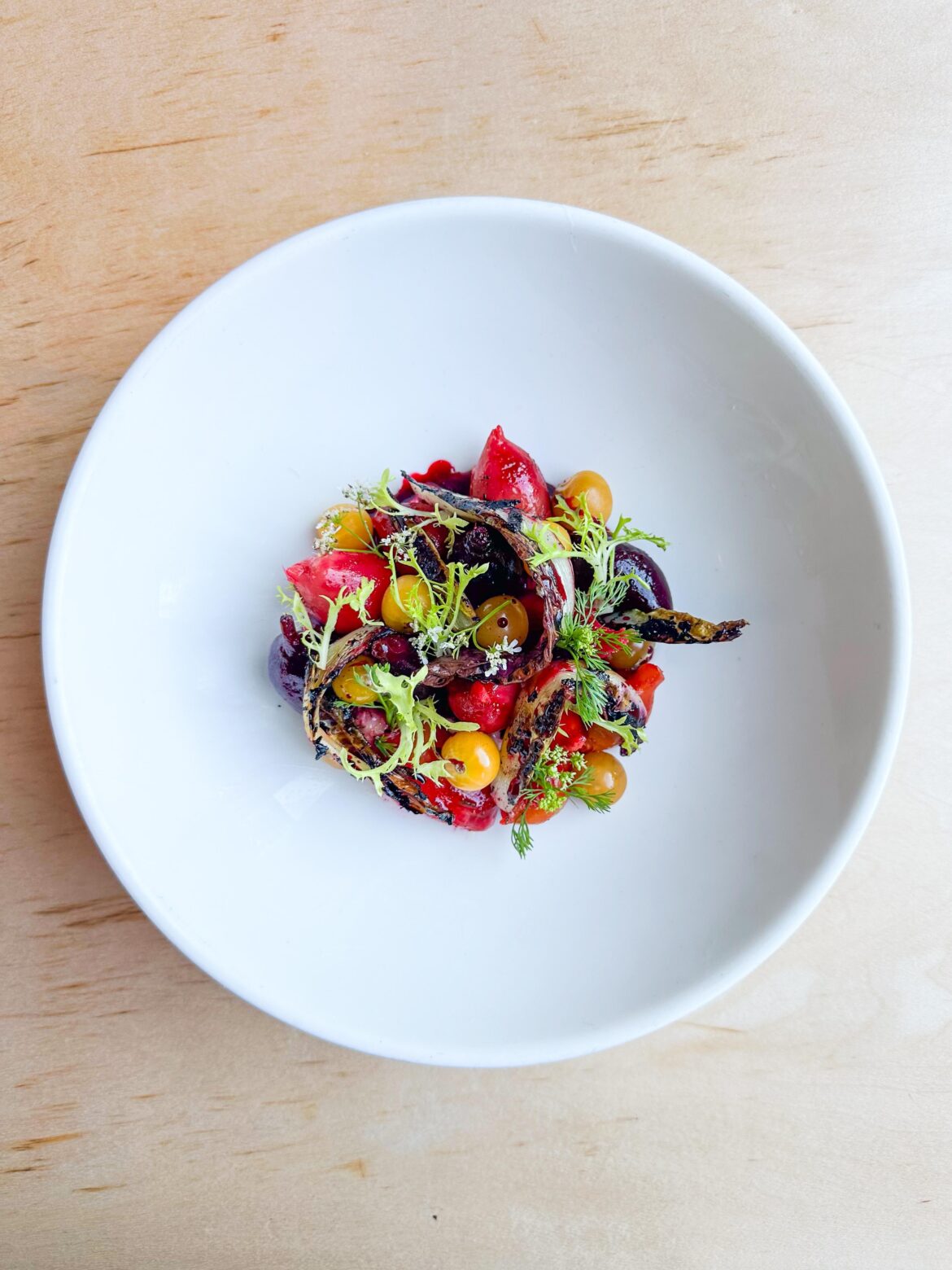 beets, farmers cheese, fermented husk cherries, grilled treviso, delfino cilantro, beet molasses, pistachio