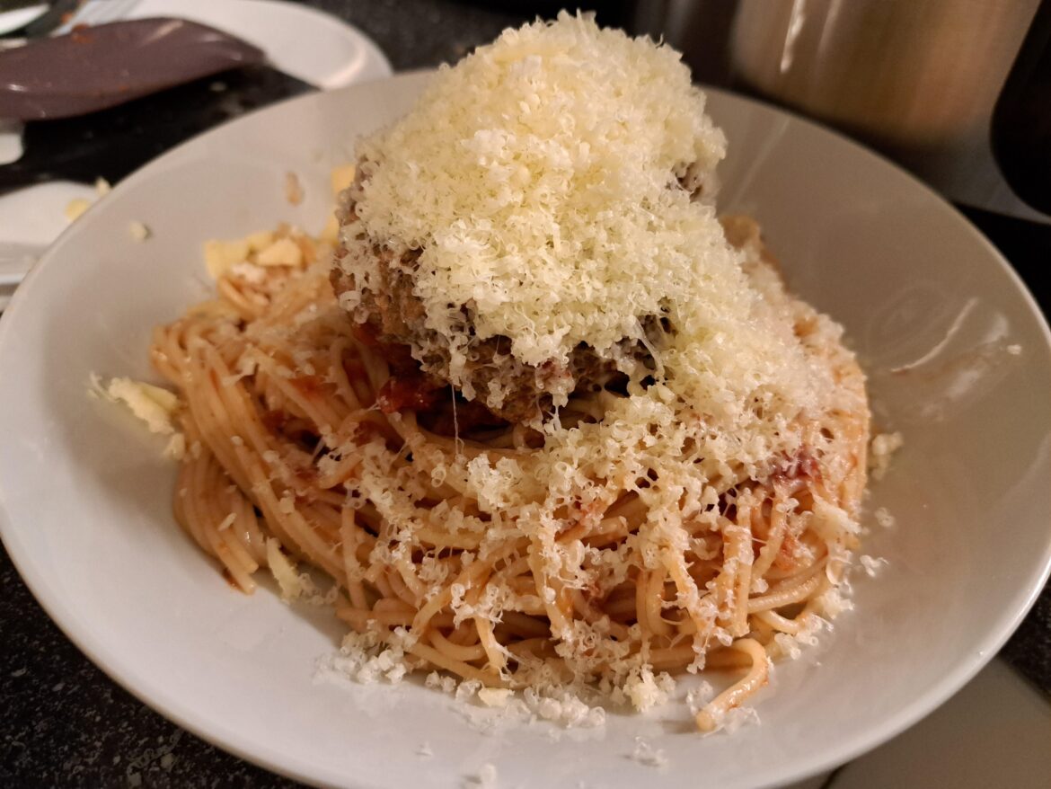 Giant meatball in tomato sauce.