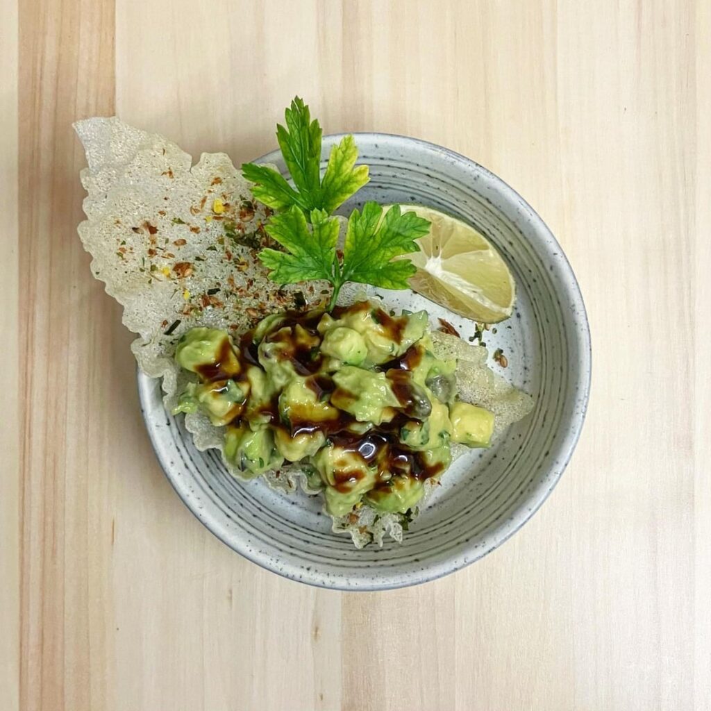 Avocado Tartare with a Seasoned Rice Paper Crisp and Soy Honey Glaze
