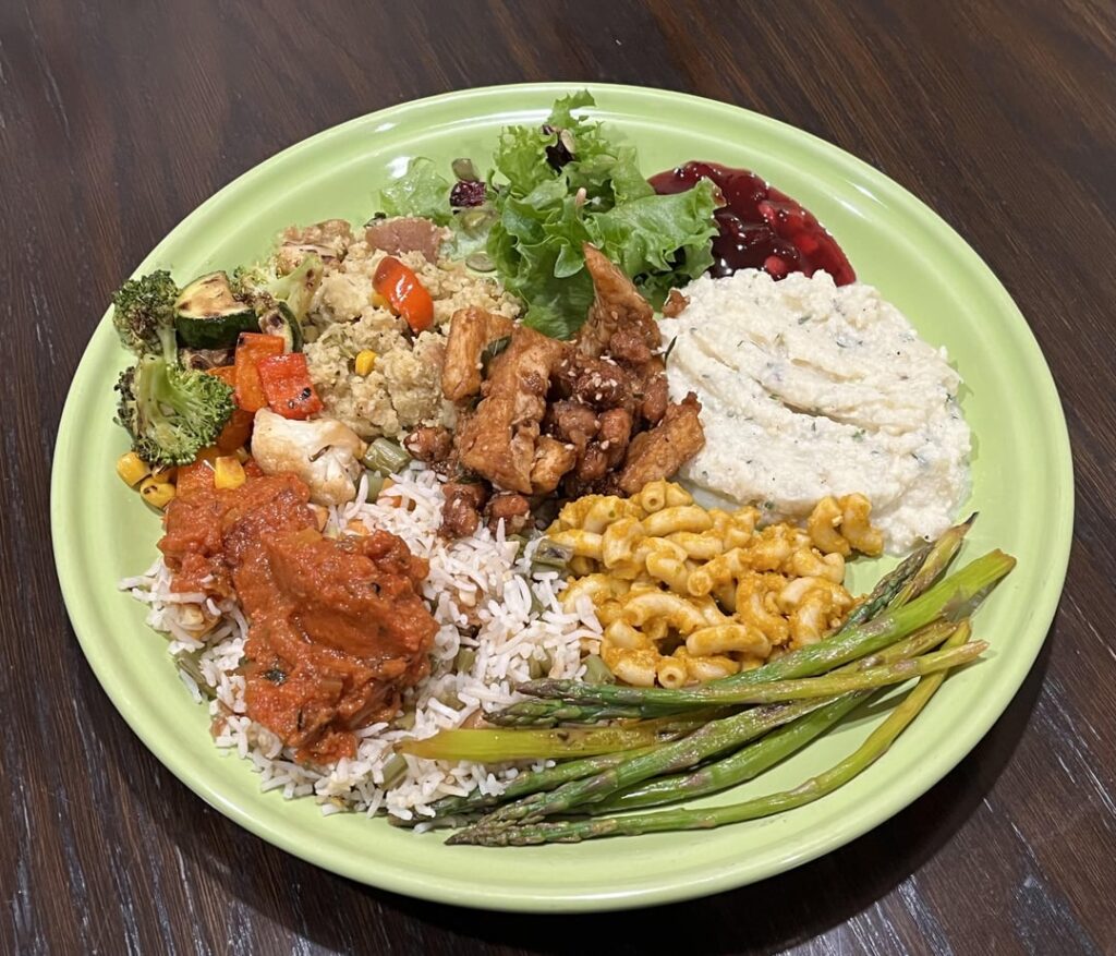 Hosted big Thanksgiving dinner yesterday - mashed potatoes, gravy, cranberry sauce, green bean rice, roasted veggies, sesame tofu, roasted asparagus, bread rolls, pumpkin pie, Apple pie.