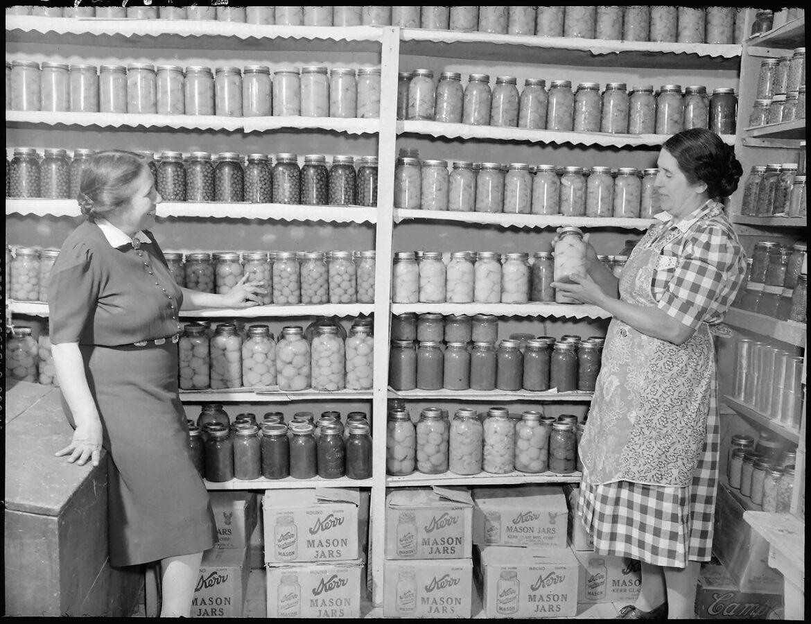 Mrs. Fidel Romero proudly exhibits her canned food. New Mexico c1946. Source is the Smithsonian Magazine.