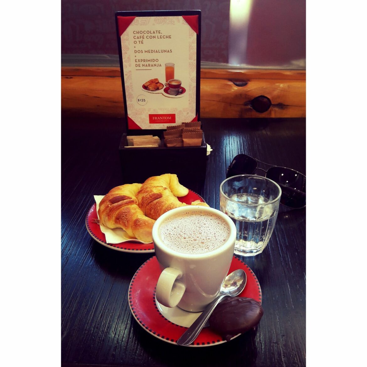 coffee with milk. which do you prefer? croissants or alfajor?