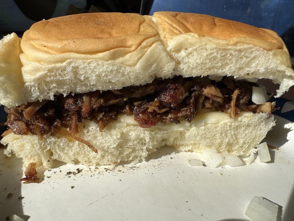 Pulled pork (crispy fried in its own fat), provolone, onions, mayo, salt & pepper on Kings Hawaiian rolls!