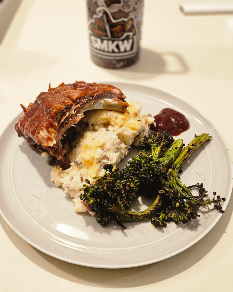 Ribs, mashed potatoes, and broccolini.