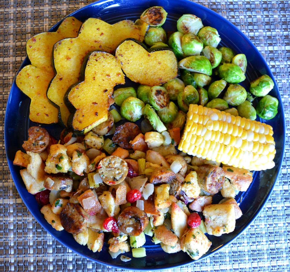 (427 calories, 27 g protein) Sausage herb stuffing, brussels, acorn
