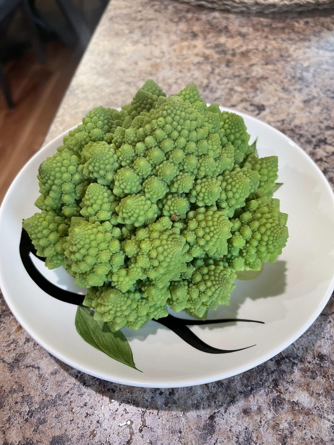 Romanesco Broccoli. A mild nutty taste. Kind of a cool. Texture of a cauliflower! Lightly Steamed for 15 minutes-added salt to taste. Has the Fibonacci sequence to it.