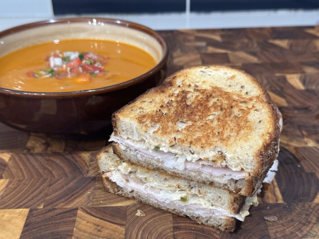 turkey, onion and habanero/jalapeño cream cheese spread on rye fried in clarified bacon fat w/homemade (not by me) tomato soup and pico.