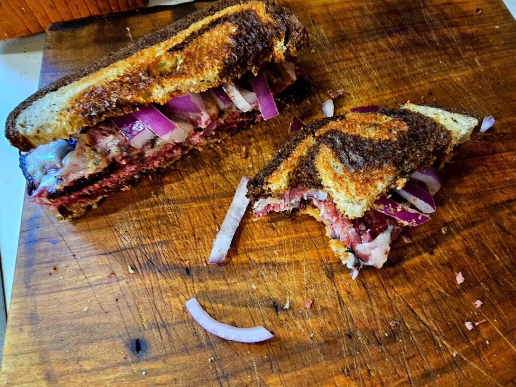 Pastrami & Swiss on Marble Rye w/ Dijon & Red Onion