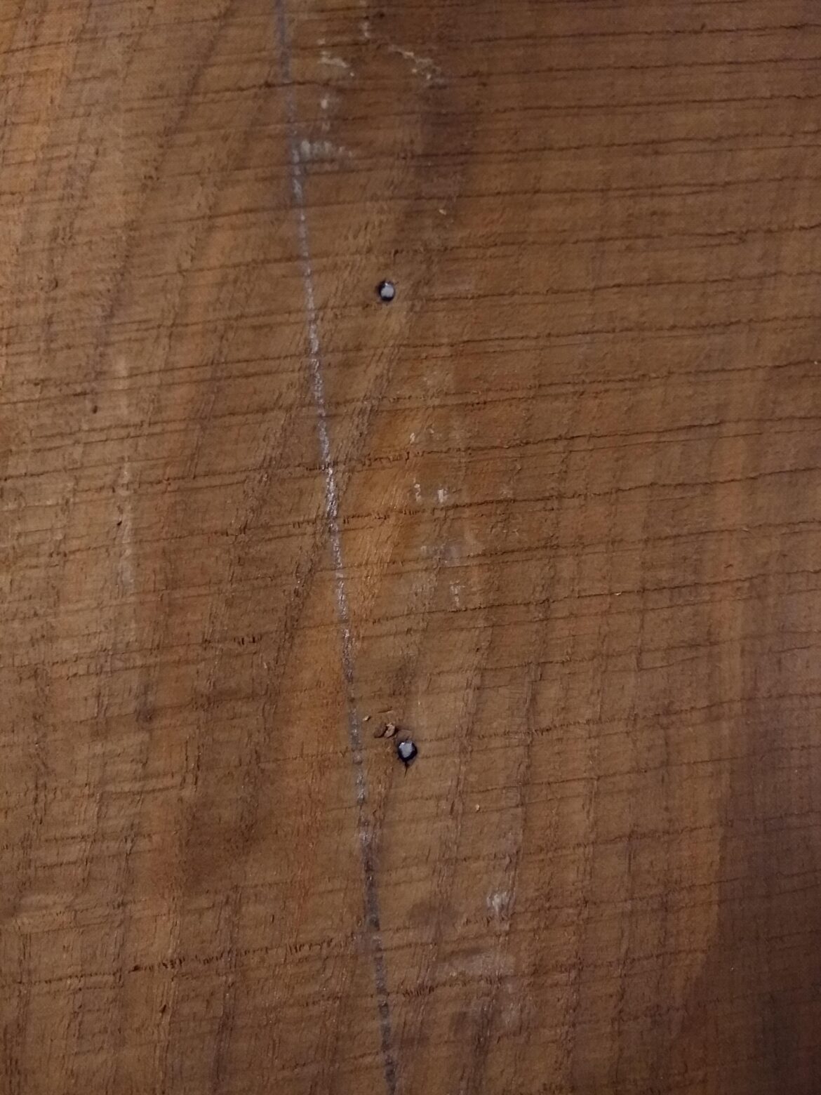 Is there a good way to remove broken screws without damaging the wood