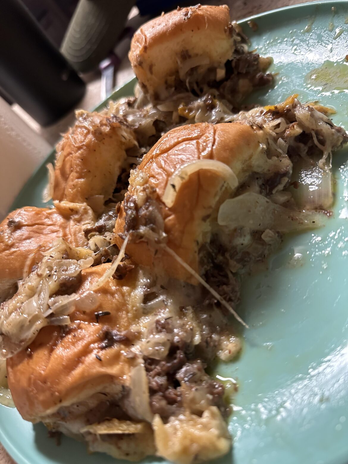 Atrociously over filled sopping wet steak and provolone sliders