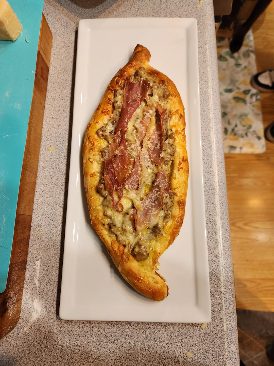 [Homemade] Khachapuri with brie, white cheddar, sausage gravy, egg