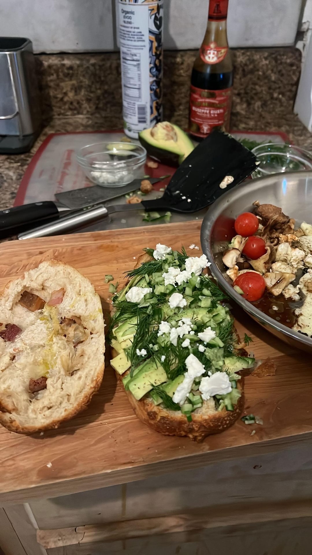 Breakfast sandwich on bacon lardon and Gruyère bread with dressed