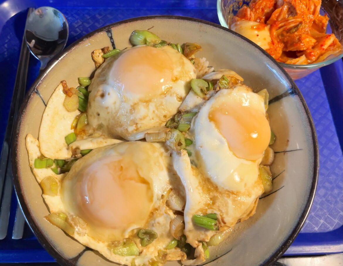 Eggs over rice with kimchi